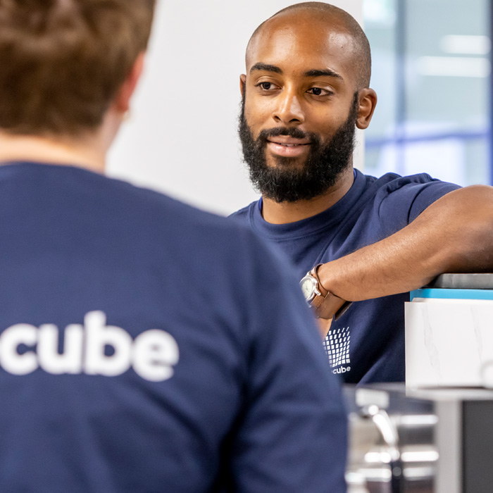 bluecube employees chatting