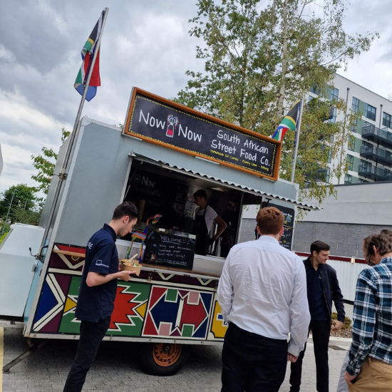 Now Now Chow street food truck outside the Bluecube office serving delicious South African food