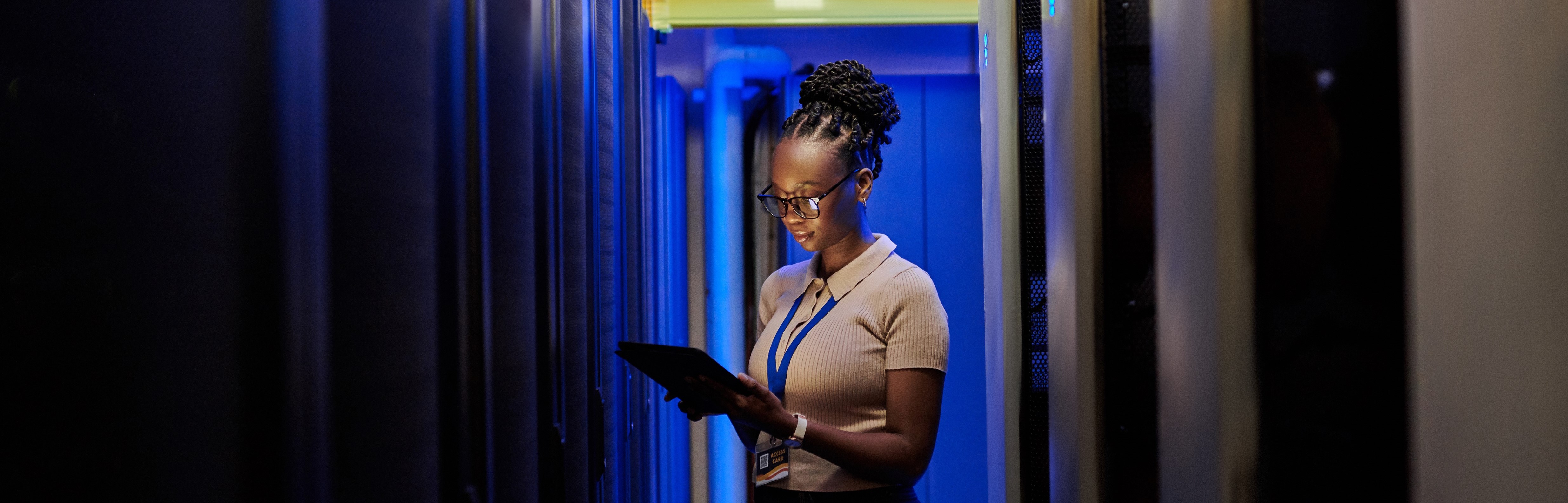 Cyber essentials - woman in data centre